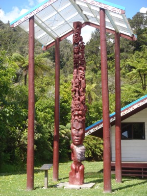 An intricately carved totem at the Mauri (native) village along the river.